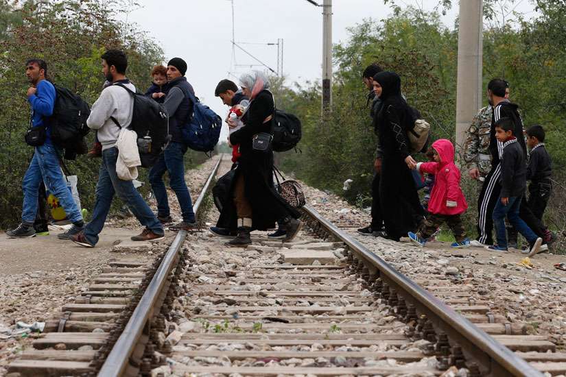 Greece's Caritas aids refugees with food, clothing, human warmth