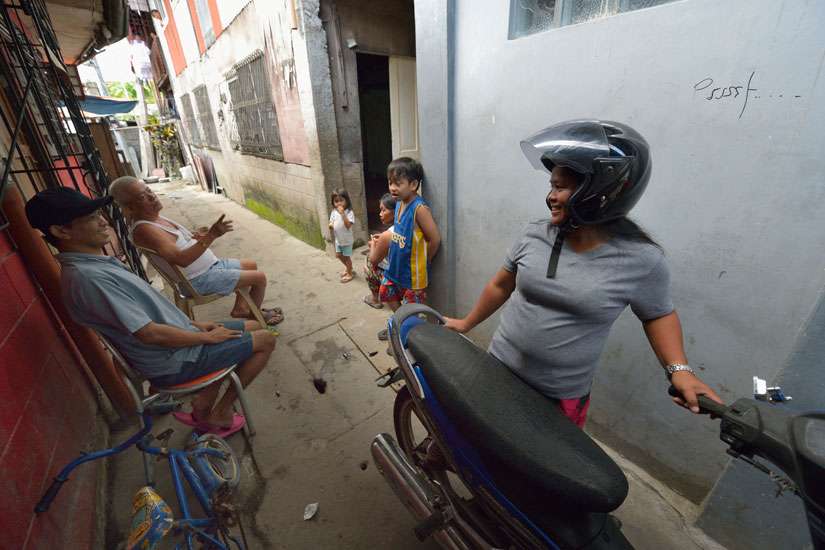 After Philippine typhoon, neighbors pulled together to rebuild lives