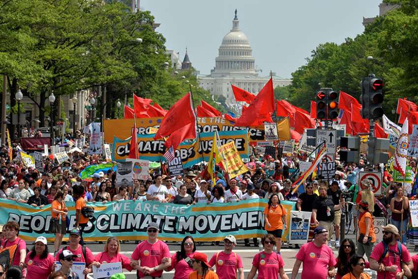Catholics bring Pope Francis' call to protect creation to climate march
