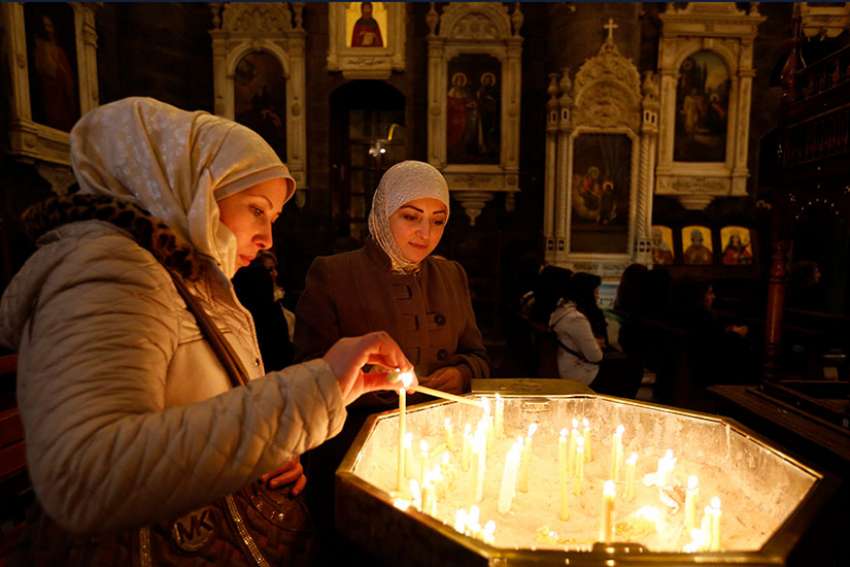 Aleppo's Christians feel protected by prayers around the world
