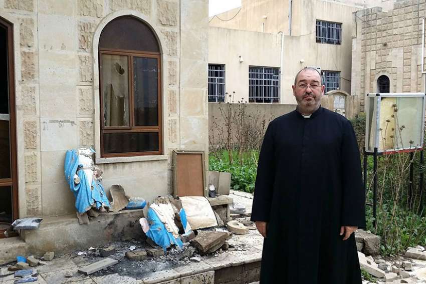“This is from the devil” – priest visits Iraqi church destroyed by ISIS