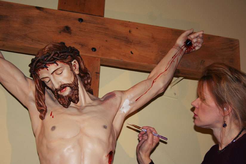 Faithful make new connection with statues, restorers finding