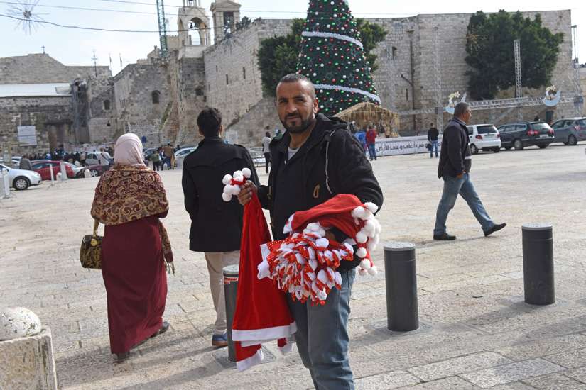 Few pilgrims, no sales: Mideast situation dampens Bethlehem Christmas