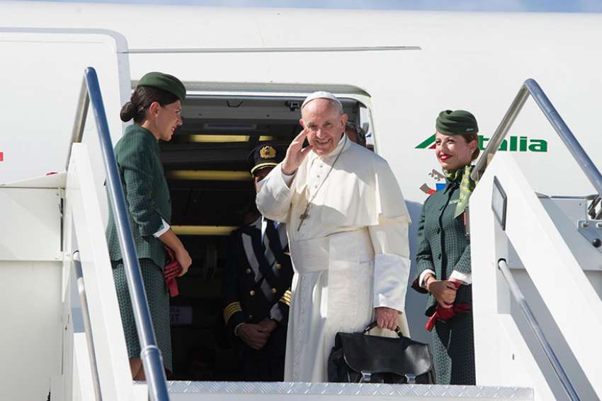 Flying to Colombia, Pope asks prayers for Venezuela