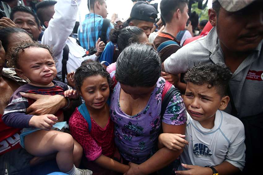 God will reward those helping migrant caravan, Mexico bishop says