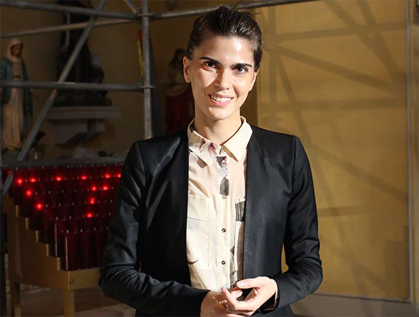Sweet sounds among the scaffolds: Opera singer rehearses in church under renovation