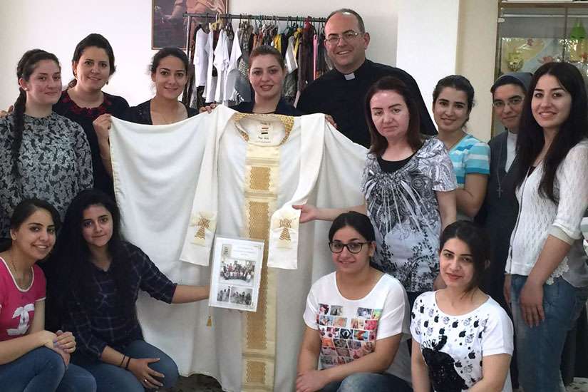 Iraqi women hope mantle sent to Pope will inspire prayers for peace