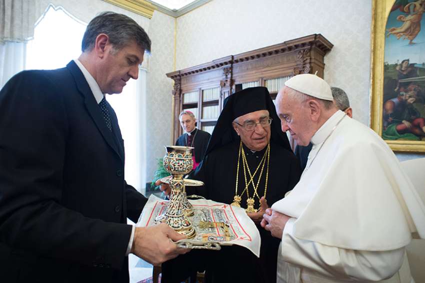 Pope, Melkite patriarch formalize full communion with Rome