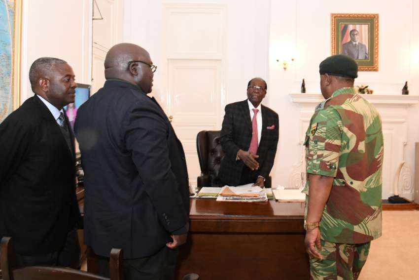 As Zimbabwe's president resigns, Catholic bishops call for peace and patience