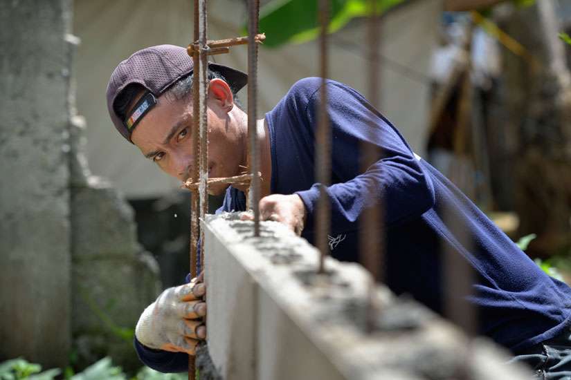 Filipinos continue to mourn loss of family, homes a year after typhoon