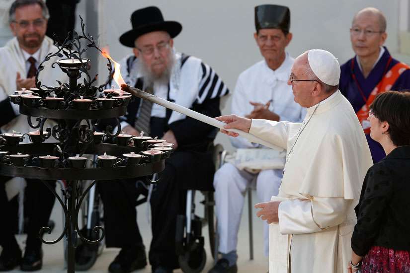 No war is holy, Pope says at interreligious peace gathering