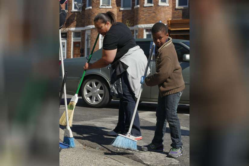 Catholics join efforts to heal, clean up, move forward in Baltimore
