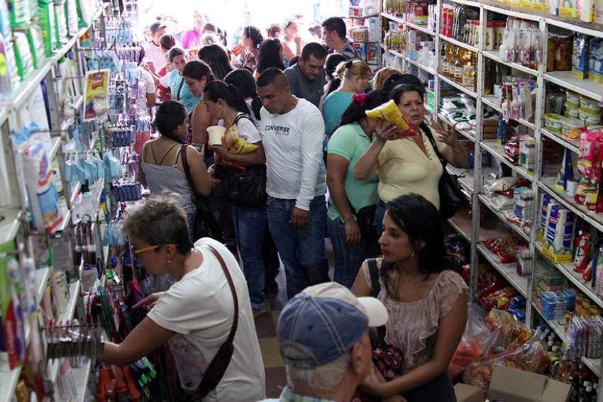 Amid crisis, some Venezuelans are eating at garbage dumps, says local priest