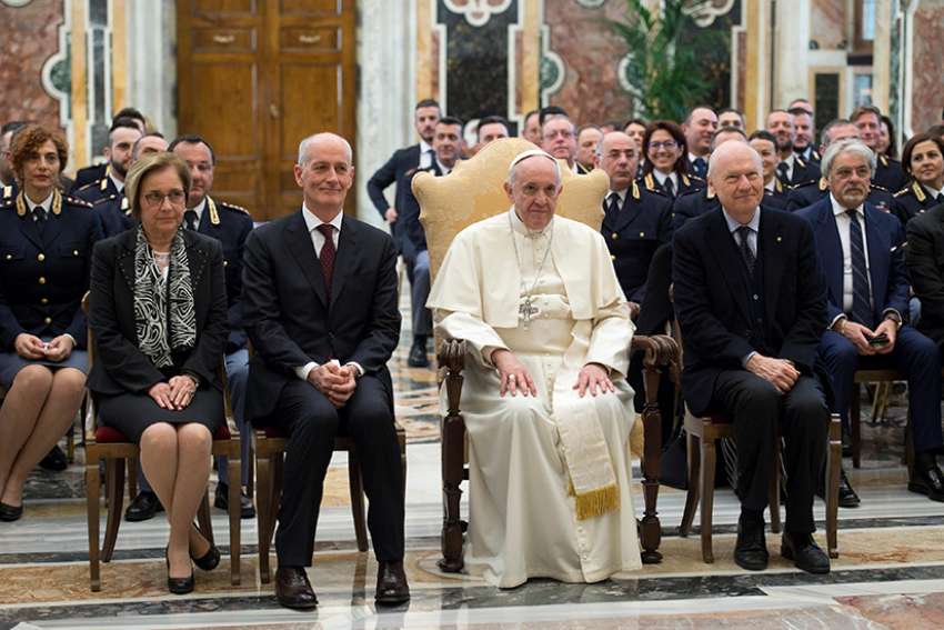 Like St. Joseph, police protect pilgrims from danger, Pope says