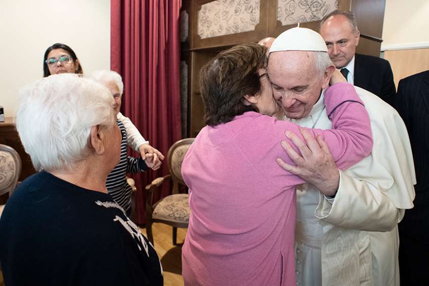 Pope makes surprise visit to community for people with Alzheimer's