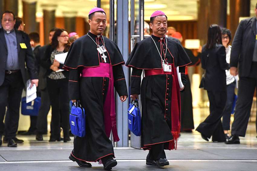 Who are the excommunicated Chinese bishops received back into ecclesial communion?