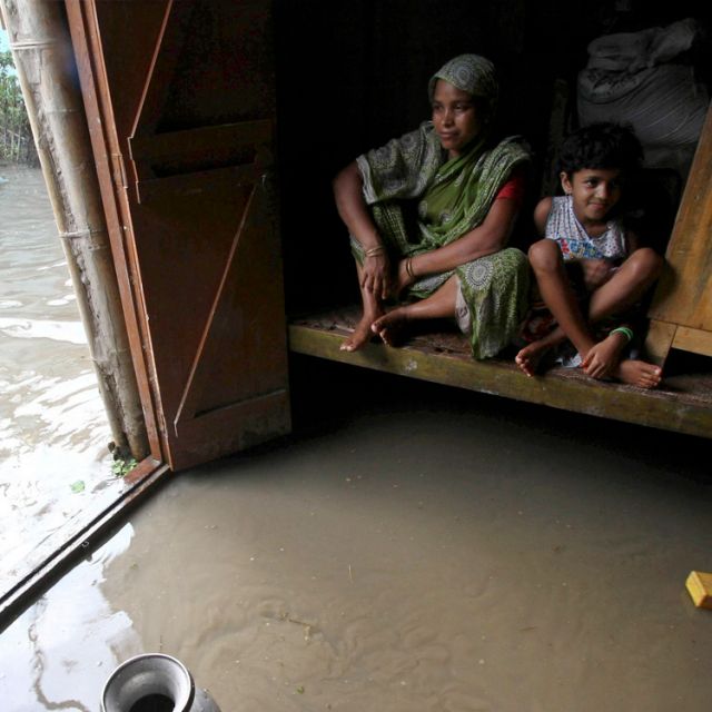 Flooded India: Women, children, cattle jostle for space in relief camps 