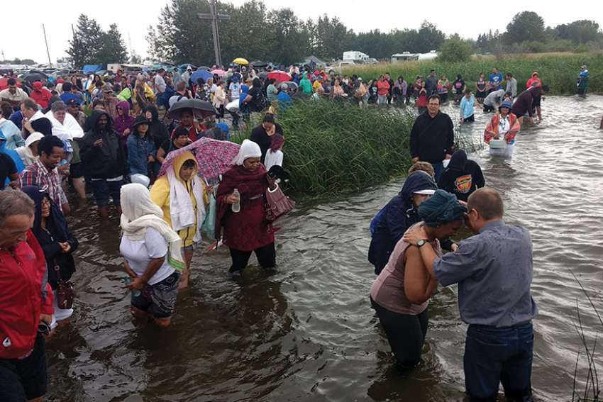 Pilgrims drawn to sacred shores of Alberta's Lac St. Anne