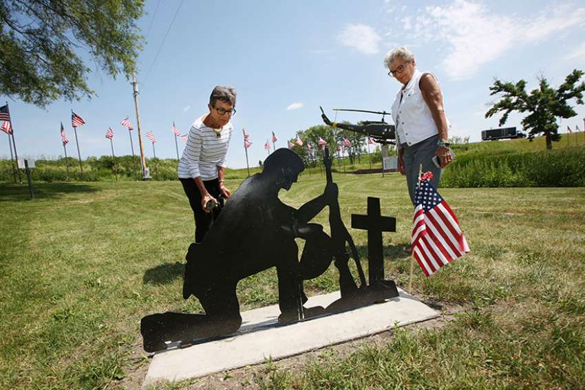 After protests over Satanic memorial, city nixes all religious symbols