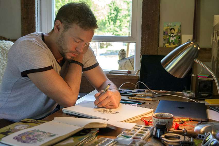 Catholic cartoonist draws inspiration from fantasy classics, family life