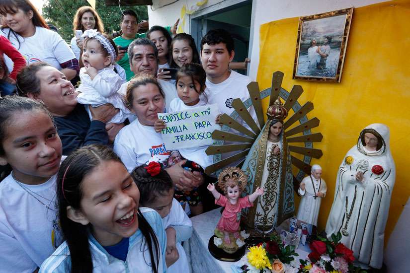 Pope says Paraguayans in poor barrio remind him of Holy Family