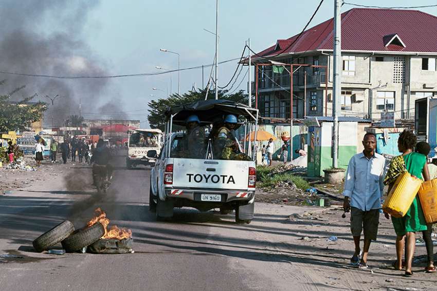 Demand for cellphone metals thwarts efforts to end war, says Congolese priest