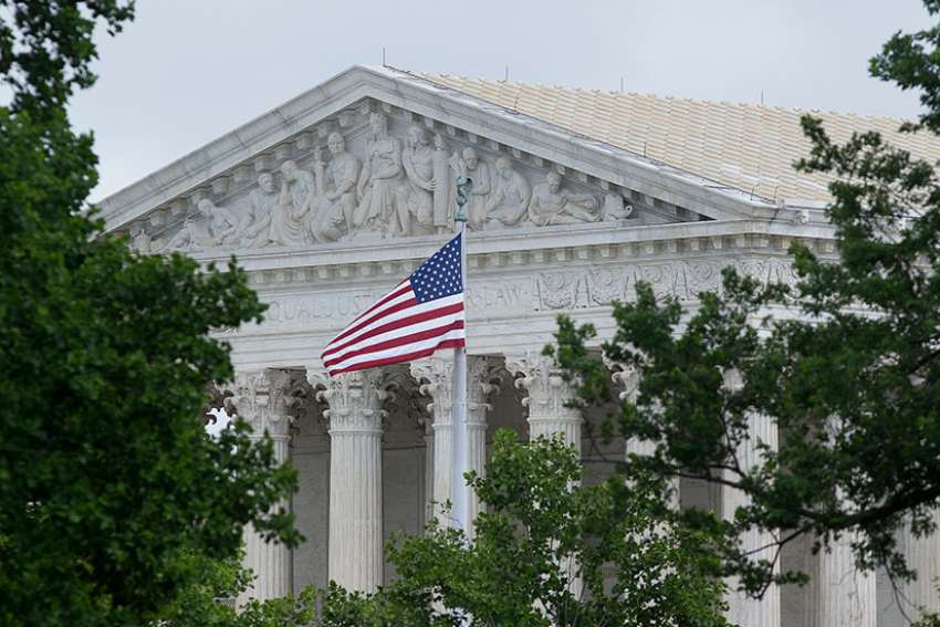 U.S. Supreme Court says travel ban exemption can include grandparents