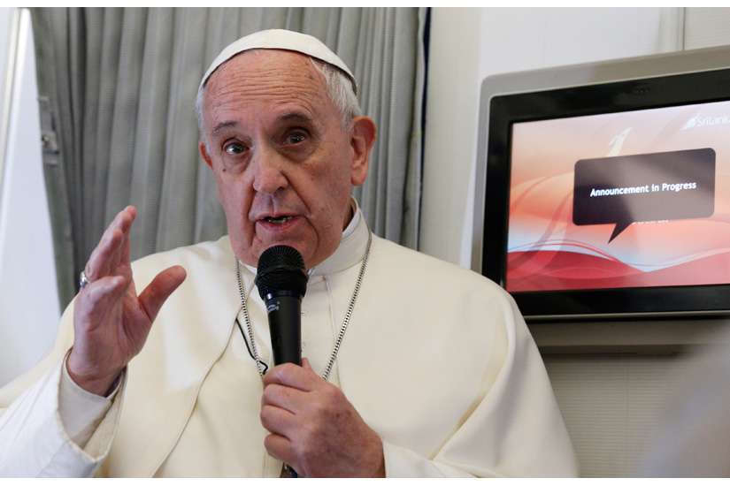 Pope says respect for religion should limit freedom of expression
