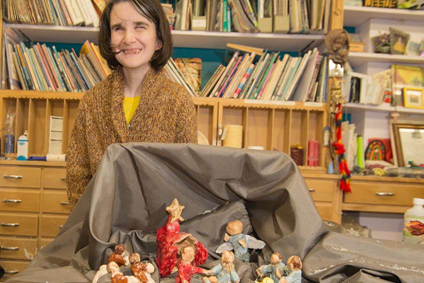 Faith lights the way for blind potter