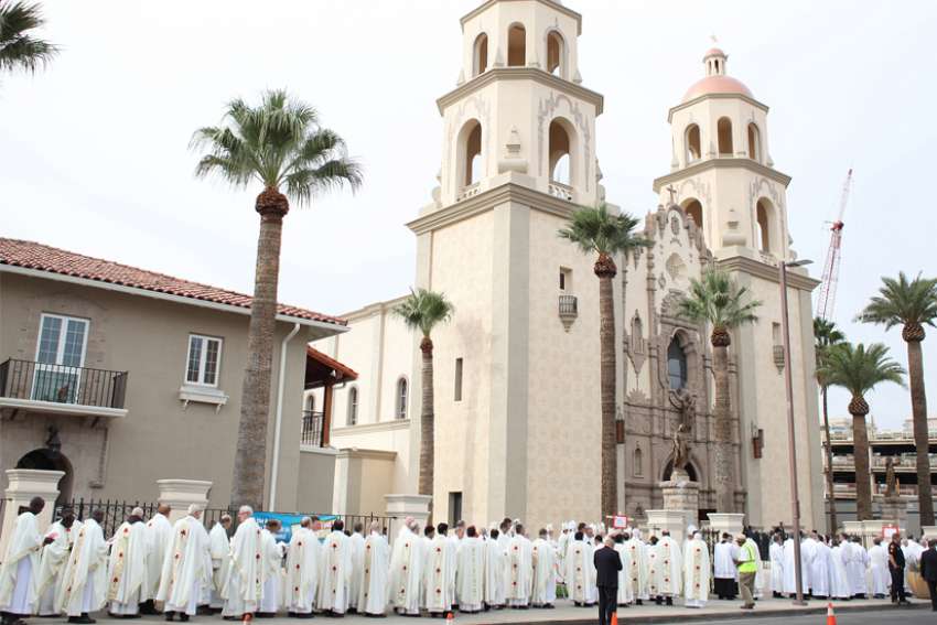 Tucson bishop suspends public worship amid spike in virus cases