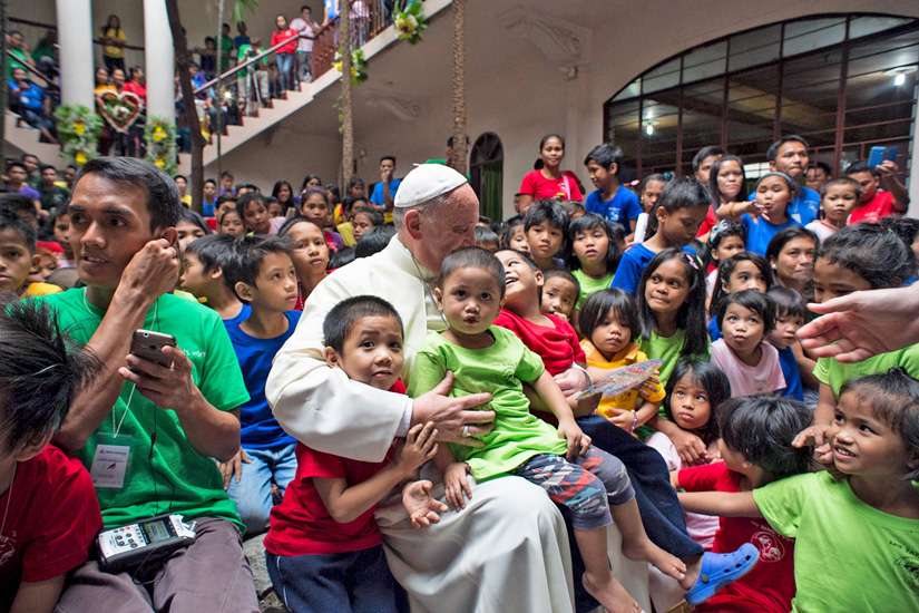 Surprise papal meeting with former street kids features songs, hugs