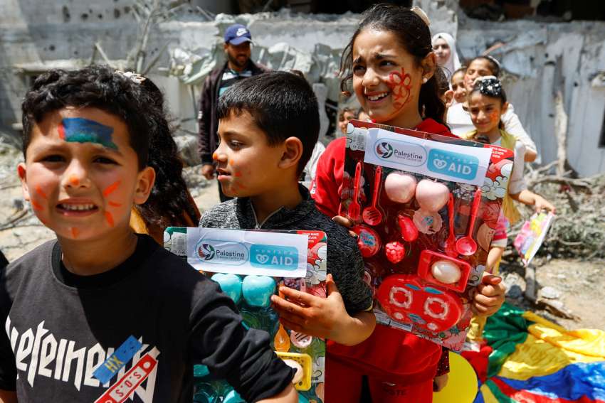 Gaza priest helps calm traumatized community