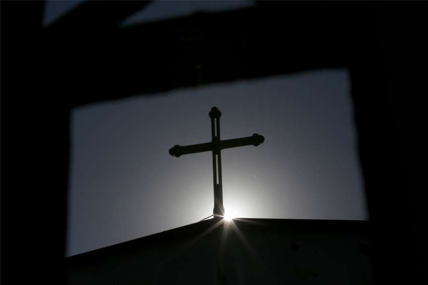 Chinese communist officials remove crosses from two church buildings
