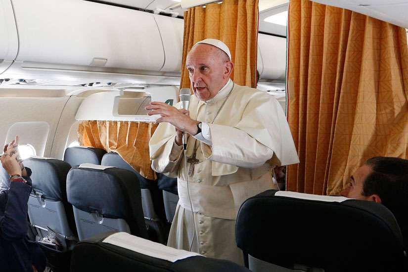 'The world is at war,' but religions are not, Pope says on way to Krakow