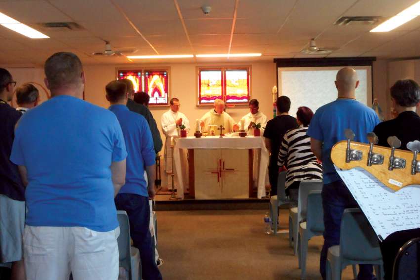 Priest refuses to leave prison ministry
