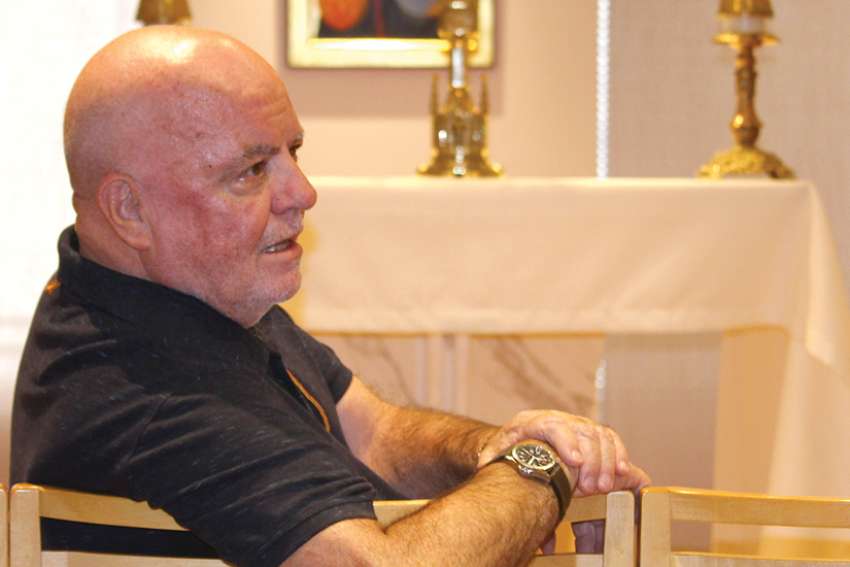 Fr. Paul Hansen being honoured with Pax Christi award