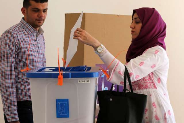 Iraqis in Jordan go to the polls, hoping for stability at home