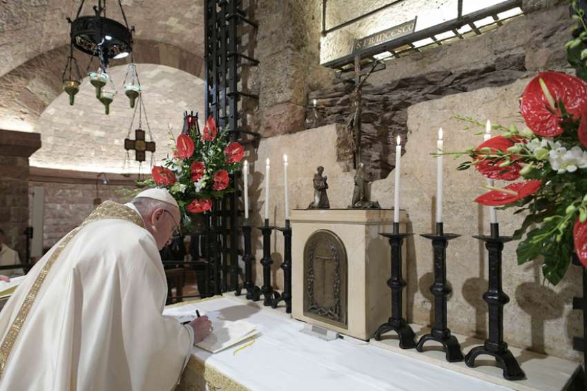 Pope Francis signs new encyclical in Assisi