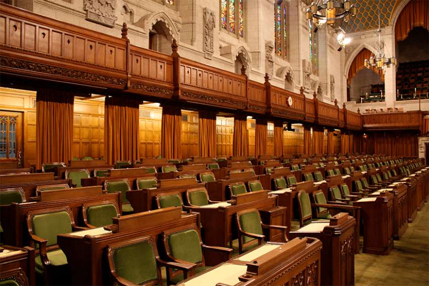 The Register Archive: Fr. Andy Hogan is Parliament's first priest-MP