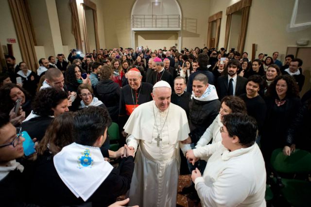 At Rome parish, pope meets with migrants, homeless, youths 