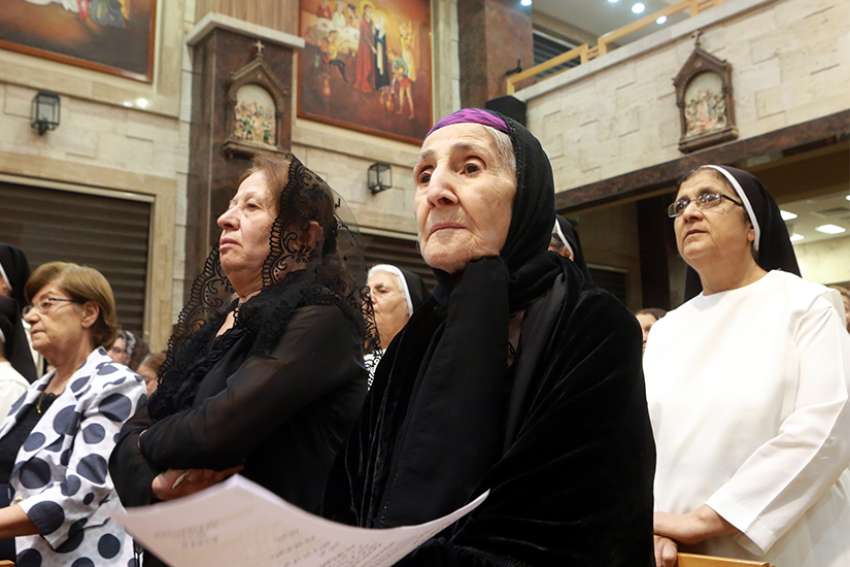 Iraqi women visit historic monastery after its recapture from Islamic State