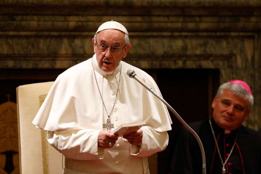 Pope Francis lays out 12 guiding principles for reform of the Roman Curia
