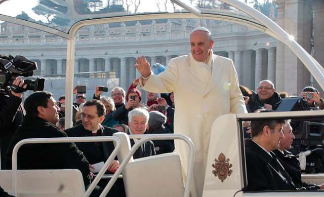 Priest says hitching ride on popemobile was invite to hit road for God