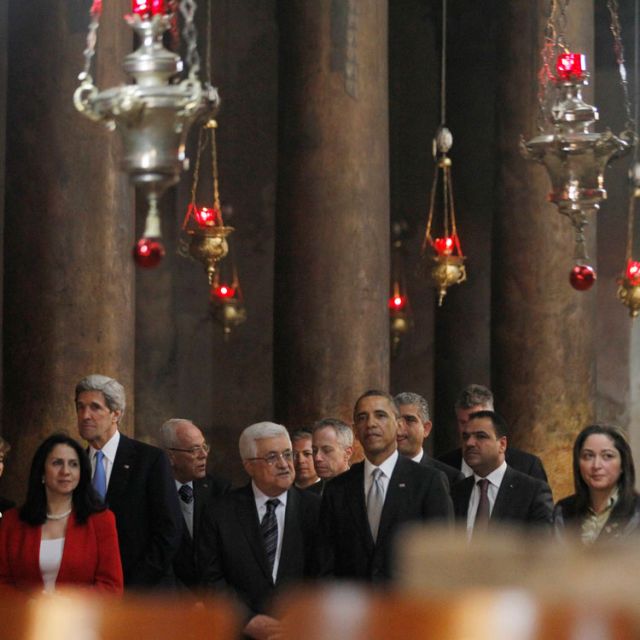 Obama lights candles, prays at Bethlehem's Church of Nativity compound