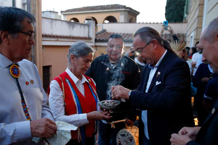 After meeting indigenous vow to stand with Pope Francis