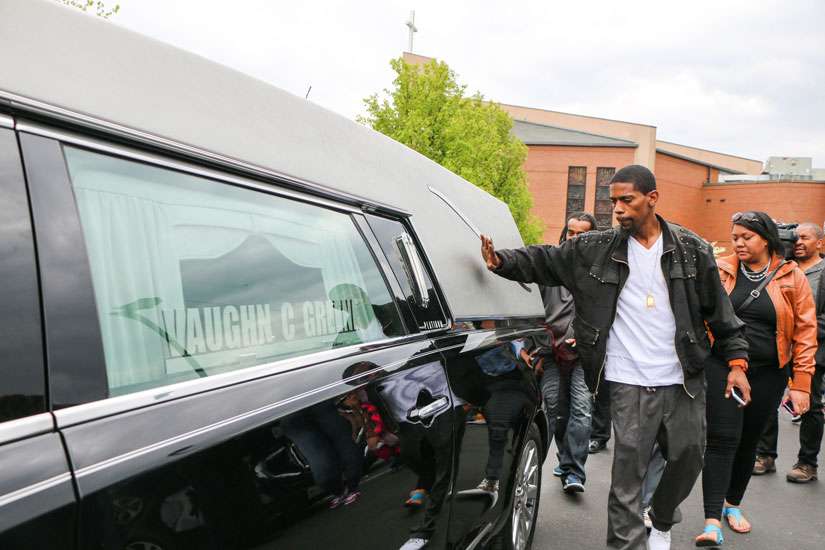 Fleeting peace as Baltimore pays final respects to Freddie Gray