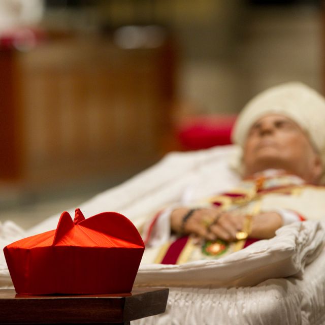 Catholics at Cardinal Foley's funeral consoled for 'death in family' 