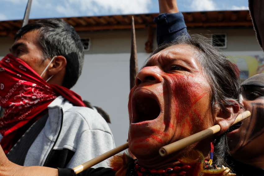Ecuador's president rolls back austerity measures that triggered protests