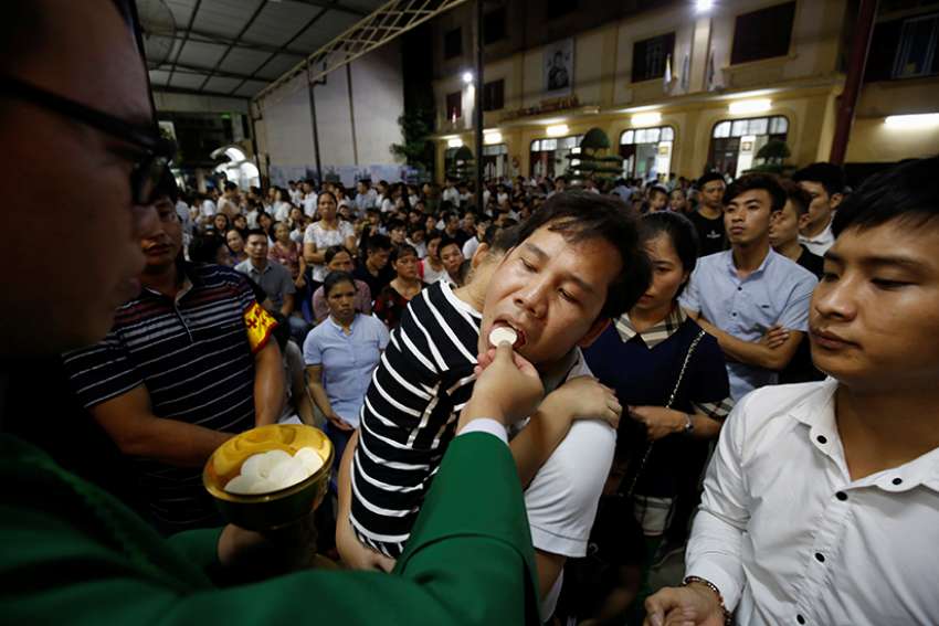 Vietnamese diocese begins rebuilding church ruined in '67 U.S. air raid