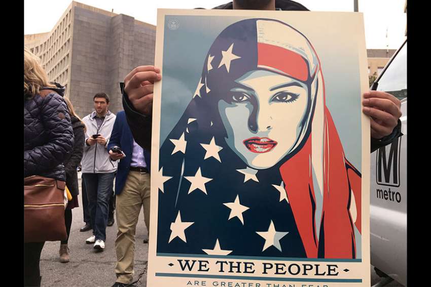 In a hijab at the inauguration, Muslim woman says: Here I am
